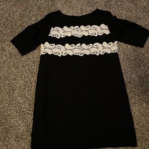 Black Maggy London Dress with white lace details.